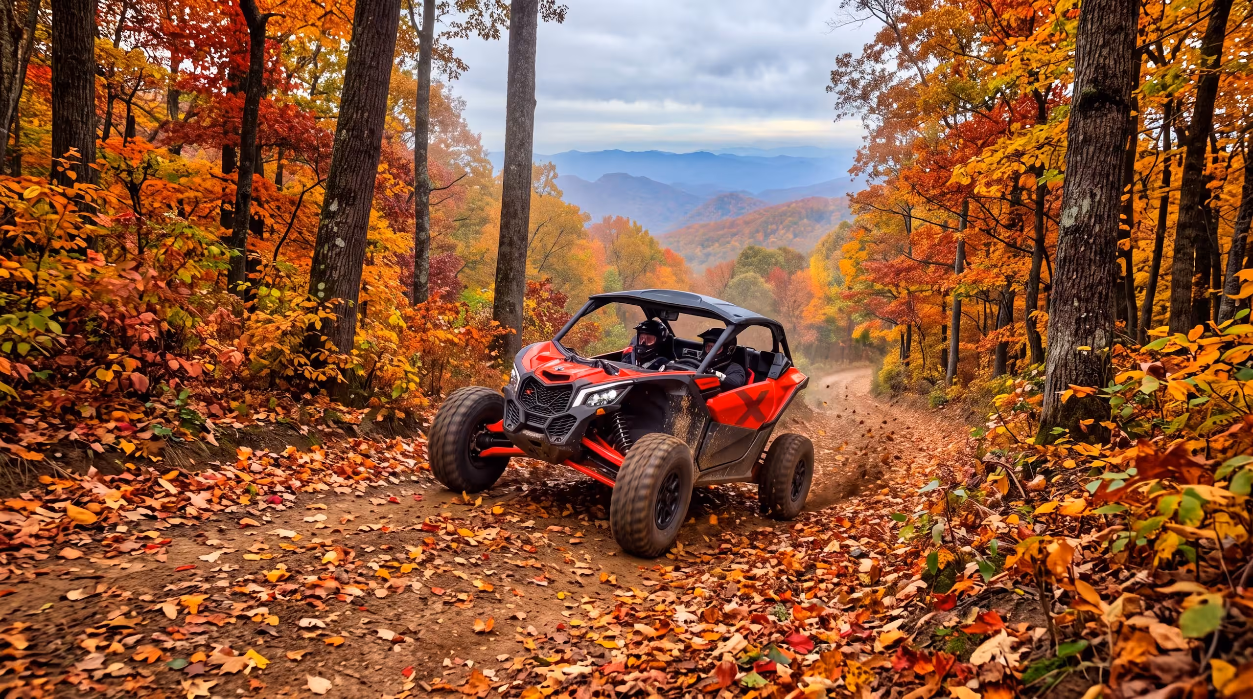 A red UTV driving down an autumn trail in the High Country